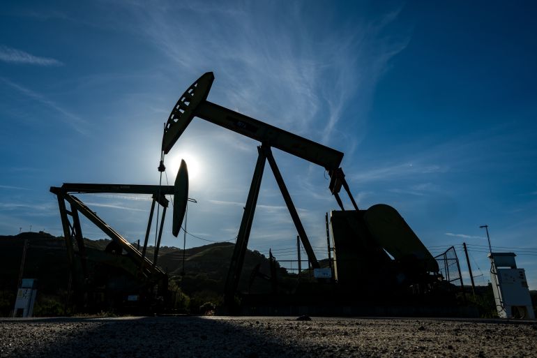 Oil wells at the San Ardo oilfield in California, March 2026. Brent crude briefly surged to $126 per barrel on April 30 — a four-year high — as the dual Strait of Hormuz blockade entered its 17th day and Trump told Iran to "cry uncle." (AP / Al Jazeera)